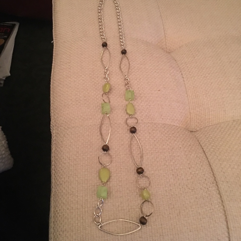 Silver necklace with green and brown beads